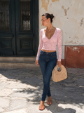Haut en dentelle transparente rose